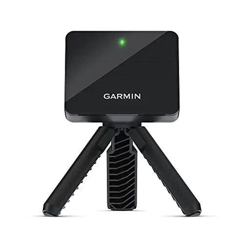 Garmin Approach R10 portable launch monitor on a tripod