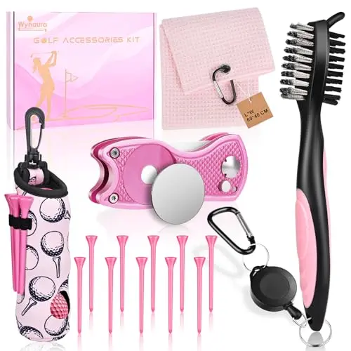 Pink golf accessory kit in a box containing a brush, towel, divot tool, tees, and ball bag.