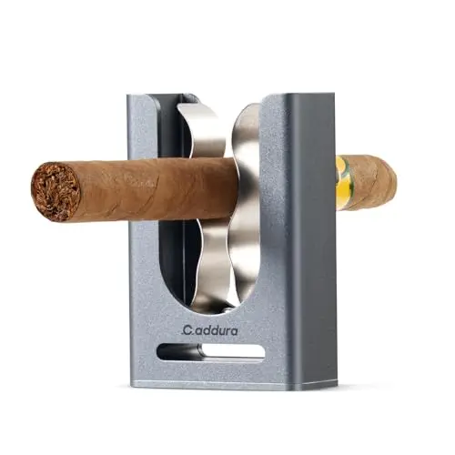 Caddura aluminum alloy magnetic cigar holder attached to a golf cart rail