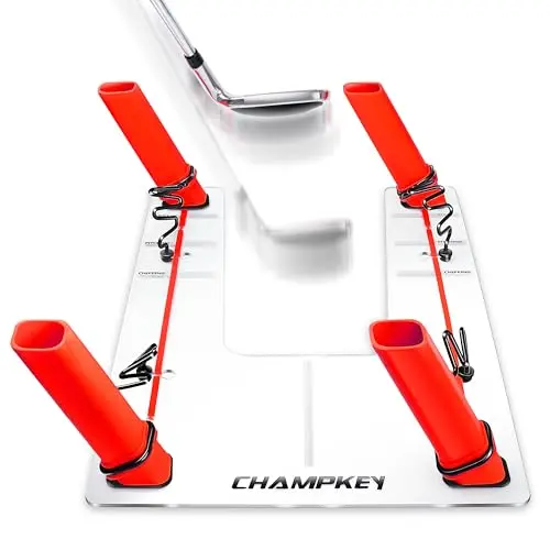 CHAMPKEY Magnetic Golf Swing Trainer on a practice mat