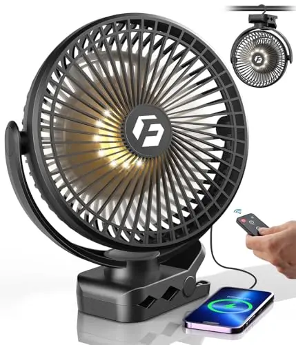 Korbot black clip-on fan with remote control on a golf cart